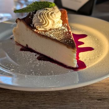 Maximilien - Cheesecake w/ berry sauce - French Near Me - Seattle, Washington Maximilien - Cheesecake w/ berry sauce - French Near Me - Seattle, Washington