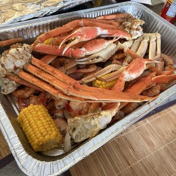 Skinner's Seafood - Snow crab, corn, red potatoes, jumbo shrimp. - Seafood Markets Near Me - Dauphin Island, Alabama Skinner's Seafood - Snow crab, corn, red potatoes, jumbo shrimp. - Seafood Markets Near Me - Dauphin Island, Alabama