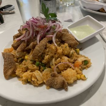 Rosario's Peruvian Restaurant - Seafood paella - Peruvian Near Me - Longmont, Colorado Rosario's Peruvian Restaurant - Seafood paella - Peruvian Near Me - Longmont, Colorado