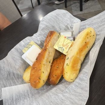 Milestone Grill - Bread sticks and butter - American Near Me - Warren, Michigan