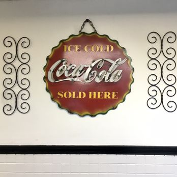 Steak Express - a coca cola sign on the wall - Burgers Near Me - Provo, Utah Steak Express - a coca cola sign on the wall - Burgers Near Me - Provo, Utah