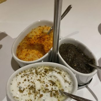 Michael Mina - Tro of Bread spreads to remind us of his Egyptian Middle Eastern/African Ancestry - New American Near Me - Las Vegas, Nevada Michael Mina - Tro of Bread spreads to remind us of his Egyptian Middle Eastern/African Ancestry - New American Near Me - Las Vegas, Nevada
