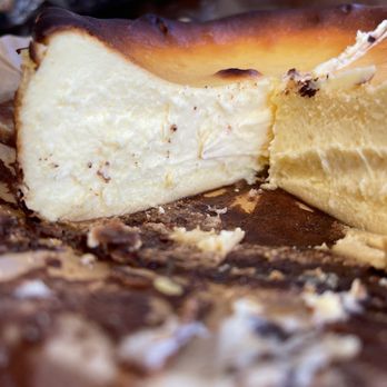Basuku - a piece of cheesecake with a bite taken out of it - Desserts Near Me