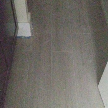 Eco Smart Tiles - a bathroom with a toilet and sink - Self Storage Near Me - Bellevue, Washington Eco Smart Tiles - a bathroom with a toilet and sink - Self Storage Near Me - Bellevue, Washington