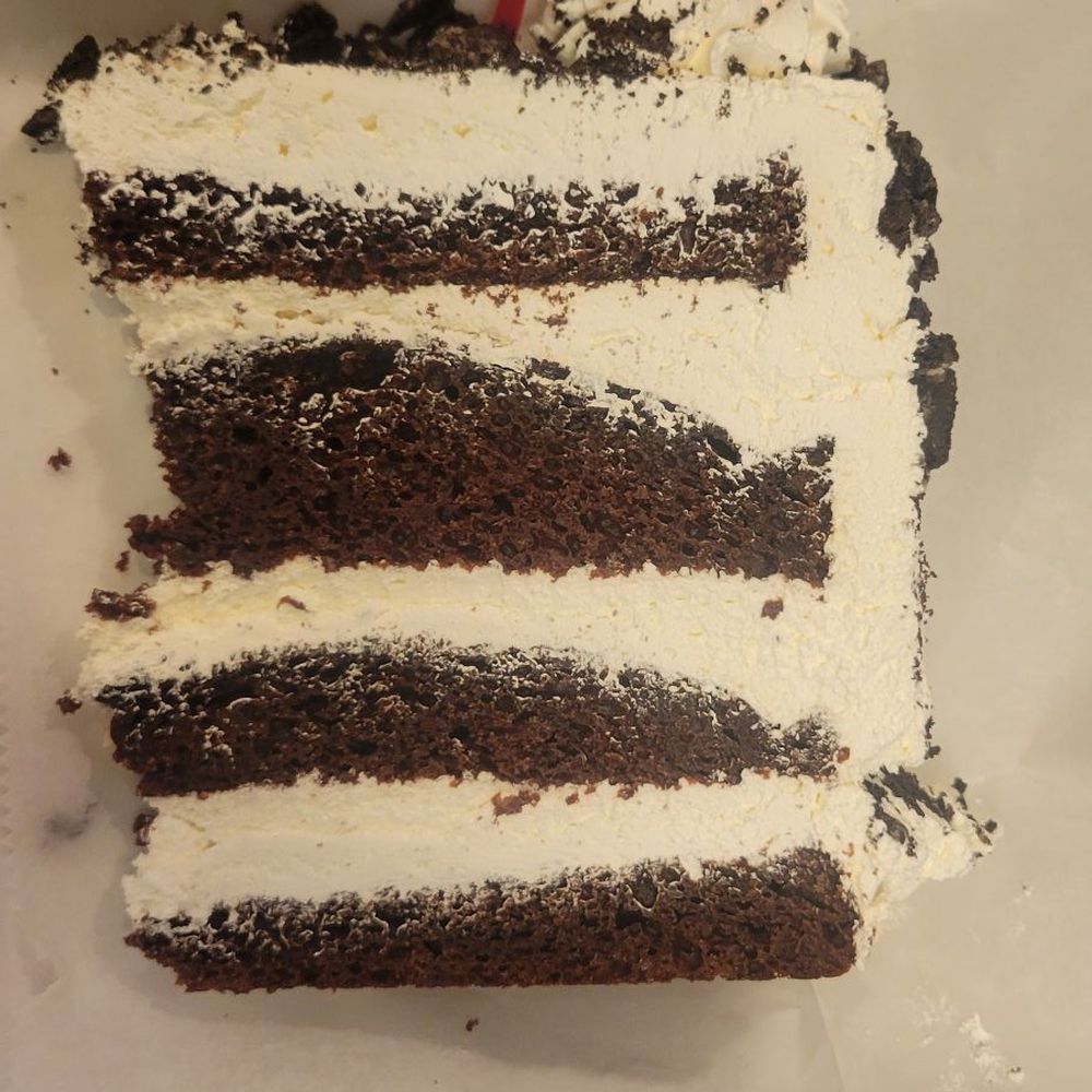 Cookies and cream cake. This may be one of the largest slices of cake ever served.