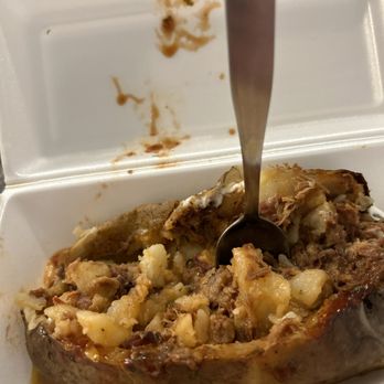 OCH Family - a fork digging into a baked potato dish - Caterers Near Me - Georgetown, Texas OCH Family - a fork digging into a baked potato dish - Caterers Near Me - Georgetown, Texas