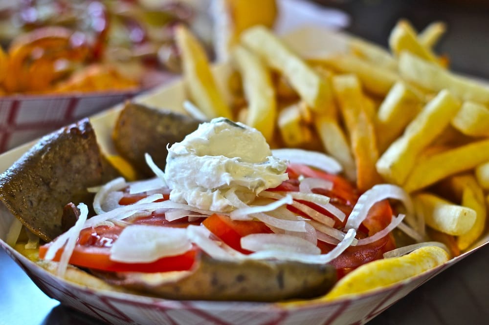 Fleck's Curbside Grill Logo