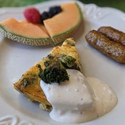 Primrose Inn - Breakfast quiche, broccoli and egg with a savory cream (not ranch).