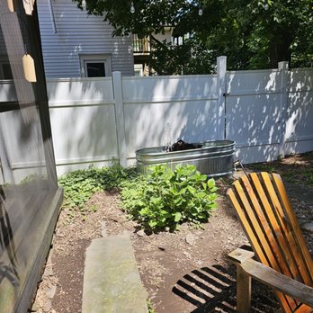 Watershed - a wooden chair in a back yard - Breakfast & Brunch Near Me - Roxbury, New York