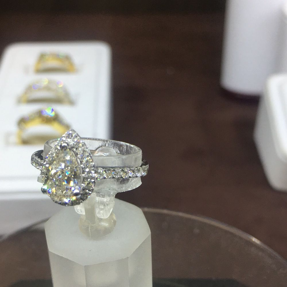 Diamond Collection & Co. - My favorite, pear shaped solitaire in a halo of diamonds. - Jewelry Near Me - Los Angeles, California