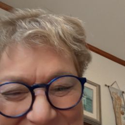Me awaiting pizza w/grandkids.