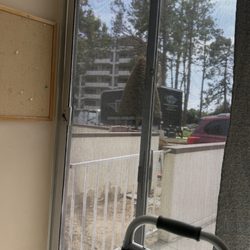 Coastal View Healthcare - This is the screen door that stays just like this all the time the glass doesn't move. There's no lock.