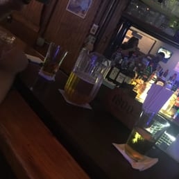 a person sitting at a bar a person sitting at a bar