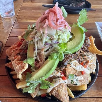 The Crouching Lion - Volcano Brisket Fries - Beer Bar Near Me - Kaaawa, Hawaii The Crouching Lion - Volcano Brisket Fries - Beer Bar Near Me - Kaaawa, Hawaii
