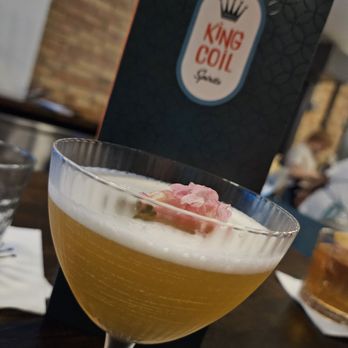 King Coil Spirits - a glass filled with a drink - Distilleries Near Me - Saint Paul, Minnesota King Coil Spirits - a glass filled with a drink - Distilleries Near Me - Saint Paul, Minnesota