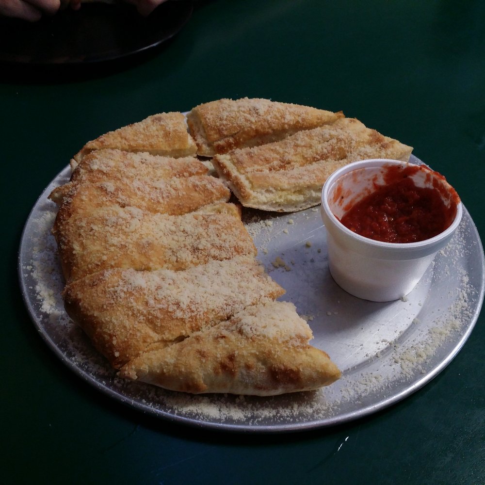 Pizza Factory - Our free breadsticks. Courtesy of yelp and the owners. Thank you!  They are delicious. - Pizza Near Me - Denair, California
