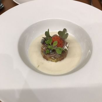 Palo Cortao - Almond cream soup with raw fish and tobiko in center - Tapas Bars Near Me - Seville, SE Palo Cortao - Almond cream soup with raw fish and tobiko in center - Tapas Bars Near Me - Seville, SE