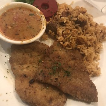 Dooky Chase's Restaurant - Veal cutlets with creole sauce & jambalaya - Cajun/Creole Near Me - New Orleans, Louisiana