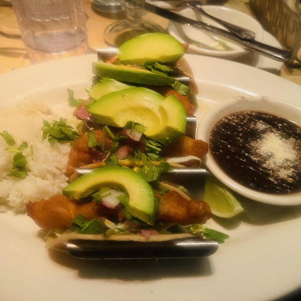 The Cheesecake Factory - Crispy Fish Tacos with sides of Black Beans and Rice. - American Near Me - Cherry Hill, New Jersey The Cheesecake Factory - Crispy Fish Tacos with sides of Black Beans and Rice. - American Near Me - Cherry Hill, New Jersey