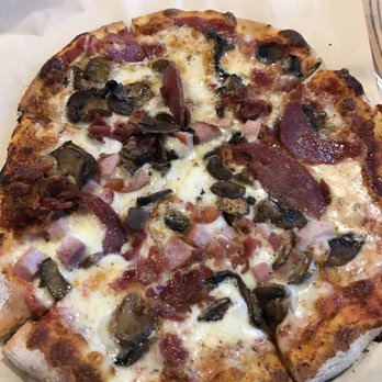 Your Pie - Marinara sauce with pesto basil. Topped with mozzarella, fresh mozzarella and Parmesan cheeses and ham, mushrooms, salami and bacon. - Italian Near Me - Suwanee, Georgia Your Pie - Marinara sauce with pesto basil. Topped with mozzarella, fresh mozzarella and Parmesan cheeses and ham, mushrooms, salami and bacon. - Italian Near Me - Suwanee, Georgia