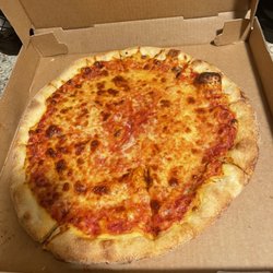 Pizza Heaven - Trying to say this is a large pizza? Absolutely not.