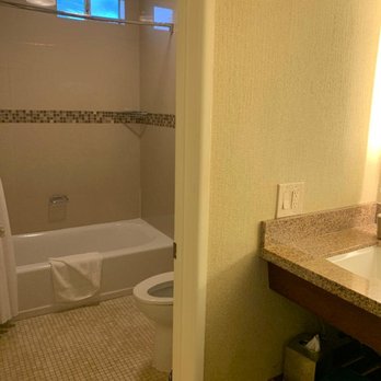 Bahia Resort Hotel - small sink counter and dim lighting - San Diego, CA