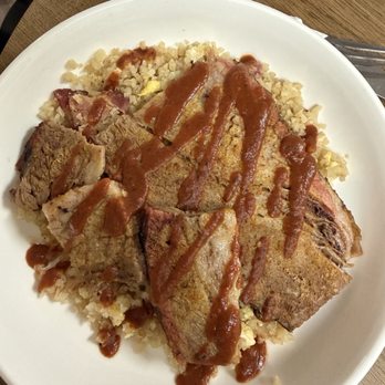 Rise Cafe - BBQ Brisket generously covering the cauliflower rice! I had to take half out for another meal! - Coffee & Tea Near Me - Honolulu, Hawaii Rise Cafe - BBQ Brisket generously covering the cauliflower rice! I had to take half out for another meal! - Coffee & Tea Near Me - Honolulu, Hawaii