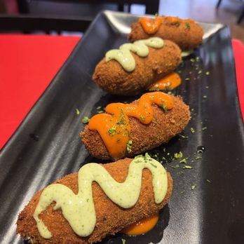 EZ Paella & Tapas - Closeup of the Croquetas de Jamon Serrano (Ham Croquettes) - Spanish Near Me - New York, New York EZ Paella & Tapas - Closeup of the Croquetas de Jamon Serrano (Ham Croquettes) - Spanish Near Me - New York, New York