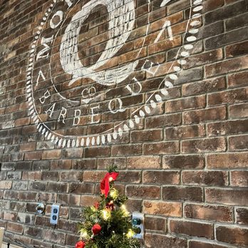 More Than Q - a christmas tree in front of a brick wall - Barbeque Near Me - Princeton, New Jersey More Than Q - a christmas tree in front of a brick wall - Barbeque Near Me - Princeton, New Jersey