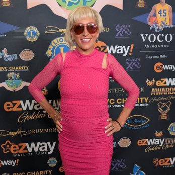 Wildroot - Posing on the Golden Carpet at BVC Better Vision for Children and Ezyway Oscars Fundraiser March 2, 2025 - Hair Salons Near Me - Tustin, California
