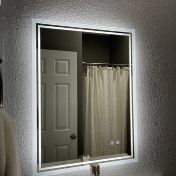 DMZ Pro & Design - LED mirror installed on a fresh new painted wall - General Contractors Near Me DMZ Pro & Design - LED mirror installed on a fresh new painted wall - General Contractors Near Me