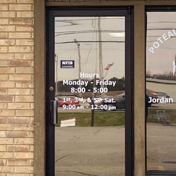 Poteau Tag Agency - Hours