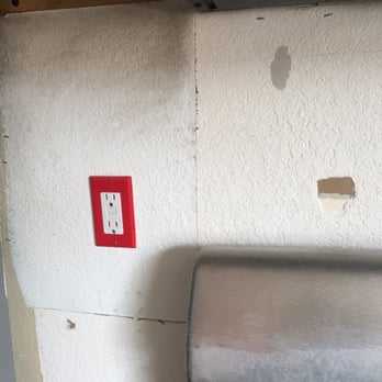 Coast to Coast Remodel - These are holes and staples left by restoraion 911. - General Contractors Near Me - Oceanside, California