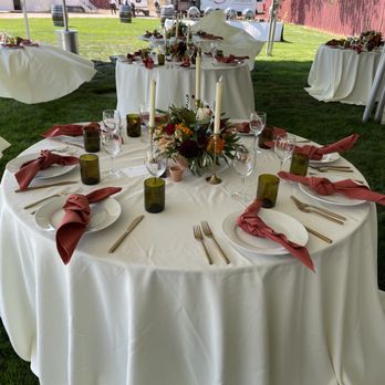 The Wild Orchid - Guest table centerpieces - Florists Near Me The Wild Orchid - Guest table centerpieces - Florists Near Me