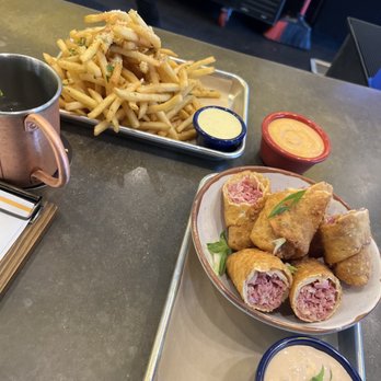 Avenue American Bistro - Reuben Egg Rolls & Garlic Parmesan Fries - Sports Bars Near Me - Wayne, Michigan Avenue American Bistro - Reuben Egg Rolls & Garlic Parmesan Fries - Sports Bars Near Me - Wayne, Michigan