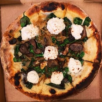 True Food Kitchen - Spinach and mushroom vegan pizza - New American Near Me - San Diego, California True Food Kitchen - Spinach and mushroom vegan pizza - New American Near Me - San Diego, California