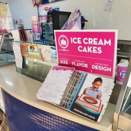 a sign for ice cream cakes