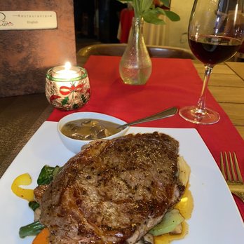 Peter's Restaurante - 14oz Ribeye Steak, medium-rare, with mushroom gravy, atop mixed vegetables and mashed potatoes. Paired with a glass of Cabernet. 9/10 *** - Modern European Near Me - Cancún, ROO Peter's Restaurante - 14oz Ribeye Steak, medium-rare, with mushroom gravy, atop mixed vegetables and mashed potatoes. Paired with a glass of Cabernet. 9/10 *** - Modern European Near Me - Cancún, ROO