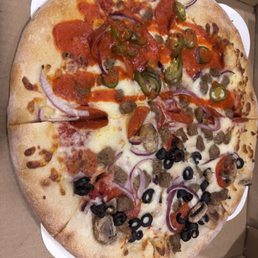 Half and half pizza of two of their pizza specialties.  You can make your own choosing your own toppings too.