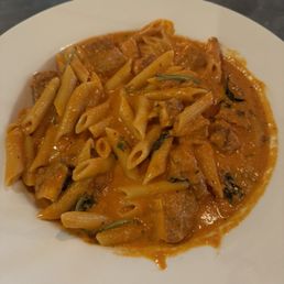 Penne a la Vodka  Served with breaded chicken