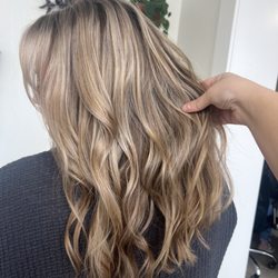 Salon Citrene - Side view of hair--cut, color, and style. Perfectly cut and styled curtain bangs.