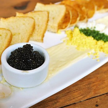 Kachka - Wild Hackleback Sturgeon Roe (28g): yeasted blini, challah, chive, butter, sieved egg ($40). - Russian Near Me - Portland, Oregon Kachka - Wild Hackleback Sturgeon Roe (28g): yeasted blini, challah, chive, butter, sieved egg ($40). - Russian Near Me - Portland, Oregon