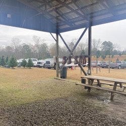 Beavers Christmas Tree Farm - Awning with saws and booth to pay for your tree - they also have hot chocolate and hot dogs!