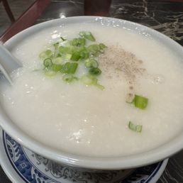 Congee at Kenny's Noodle House (can't tell from the pic but this is the preserved egg/pork version) Congee at Kenny's Noodle House (can't tell from the pic but this is the preserved egg/pork version)
