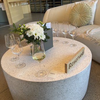 Region - a table with wine glasses and a vase of flowers - Wine Bars Near Me - San Luis Obispo, California Region - a table with wine glasses and a vase of flowers - Wine Bars Near Me - San Luis Obispo, California