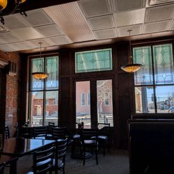 The Old Bag of Nails Pub - Front windows interior and some dining area