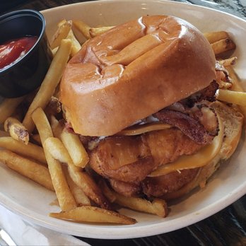 Little Pub - KICK'N CHICK'N Beer battered chicken breast, smoked gouda, bacon, mixed field greens, buttermilk ranch, and maple-bbq sauce - New American Near Me - Stratford, Connecticut
