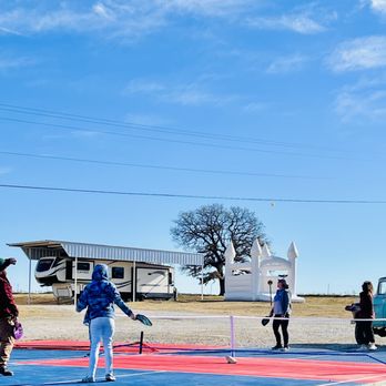 Flying Horse RV Park - people playing tennis - RV Parks Near Me - Bowie, Texas