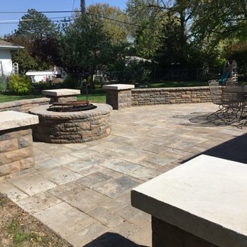 Scheller?s Lawn & Landscaping - a patio with a fire pit - Landscaping Near Me - Emporia, Kansas Scheller?s Lawn & Landscaping - a patio with a fire pit - Landscaping Near Me - Emporia, Kansas