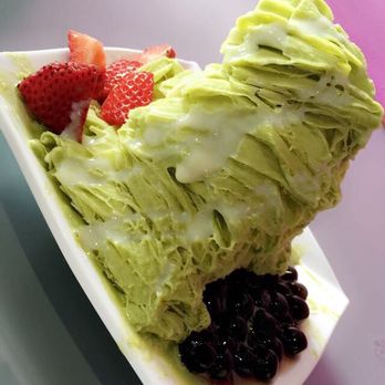 Nu Cafe - Green tea flavor with strawberries, boba, & condensed milk drizzle - Ice Cream & Frozen Yogurt Near Me - Houston, Texas Nu Cafe - Green tea flavor with strawberries, boba, & condensed milk drizzle - Ice Cream & Frozen Yogurt Near Me - Houston, Texas